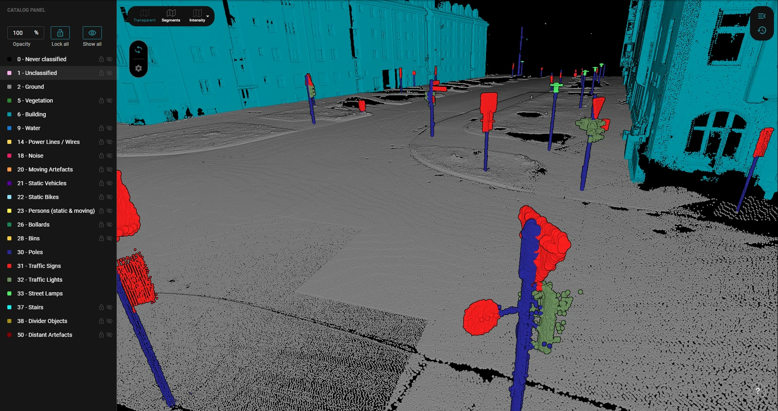 A square with poles, bollards, signs and bins picked out of the surface they stand on