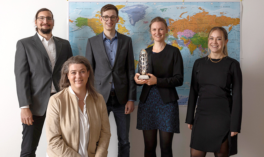 The five of us with the award
