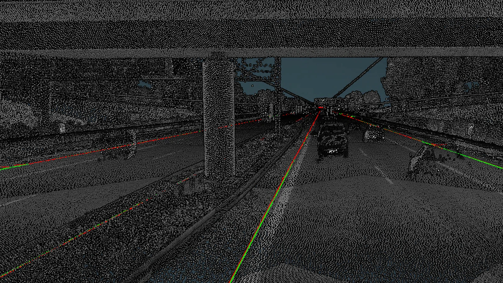 The hand drawn CAD ground truth in green, running with Pointly's detected road outline in red