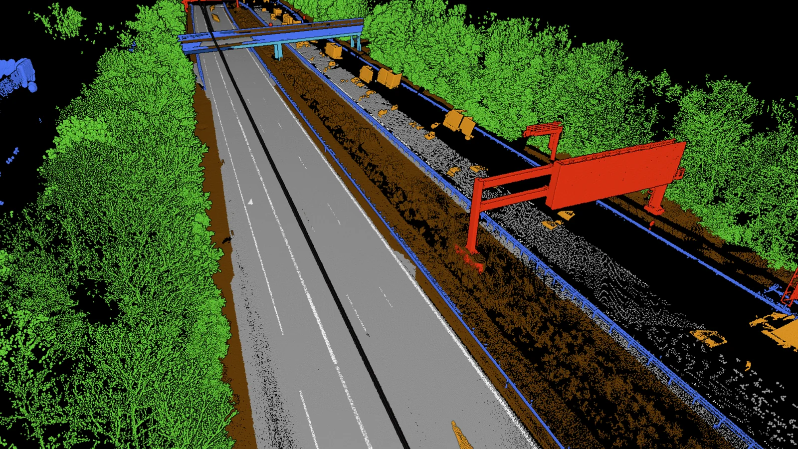 A stretch of motorway from above, the gantries in red, the guard rails in blue
