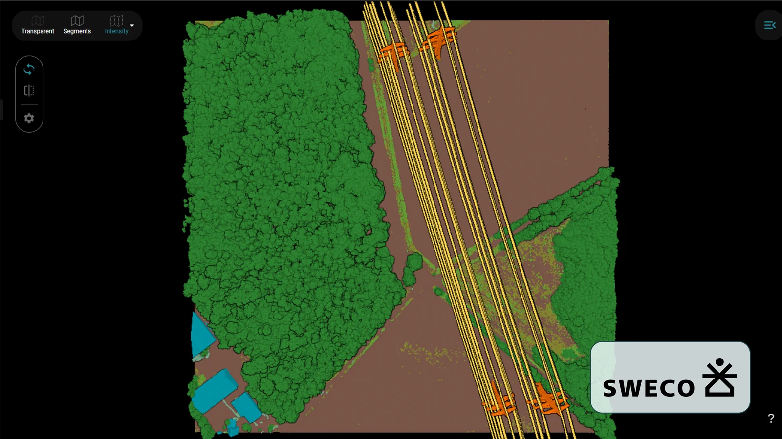 Straight down over one tile: the corridor through the forest, a tower at either end of the span, buildings at the bottom edge